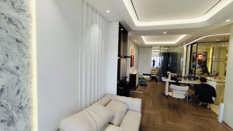 Hoàn thiện phòng khách gỗ óc chó veneer - phòng khách gỗ ấm